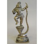 A 19thC Indian cast bronze figure, a deity standing on the head of a cobra  8"h