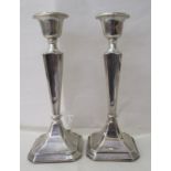 A pair of George V loaded silver candlesticks  Chester 1912  7"h