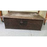 A late 18thC rustically constructed oak Bible box with straight sides and a hinged lid with a