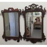 Two similar George III mahogany framed mirrors, one surmounted by a HoHo bird  26" x 16"; the