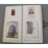 A late Victorian leather bound carte de viste album, containing portraits