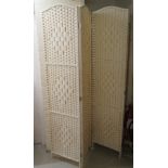 A modern six panelled paper covered dressing room screen  61"h  96"w (open)