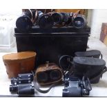 Five pairs of binoculars: to include an American 10x60 example, in an early 20thC metal box  11"h