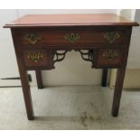 An early 19th/late 20thC mahogany lowboy, the long shallow drawer and two box drawers with