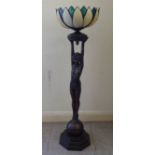 An Art Deco inspired hollow bronze table lamp, fashioned as a nude, holding aloft a coloured lead