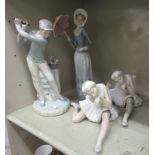 Four Lladro porcelain figures: to include two ballerinas in various poses  4"h