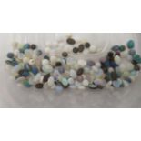Unmounted small opal beads