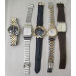 Five various modern wristwatches: to include a Tissot, faced by a baton dial