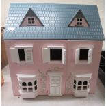 A modern MDF dolls house with a hinged roof and double opening front  24"h  24"w