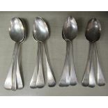A set of twelve late Victorian silver Old English pattern teaspoons with engraved initials on the