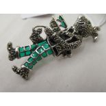 A silver coloured metal plique-a-jour and marcasite rabbit brooch