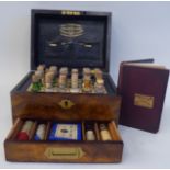 A late 19thC walnut cased apothecary's chest with straight sides, a shallow base drawer, a lacquered