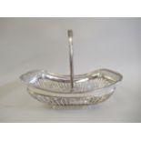 An Edwardian silver bread basket of rectangular form with uniformly looped wire sides, gadrooned