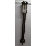 A 19thC mahogany cased and feather inlaid stick barometer, having a broken arch pediment, over a