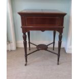 An Edwardian ebony and string inlaid crossbanded mahogany cocktail tray, set in a cantilever