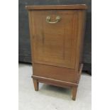 An Edwardian string inlaid mahogany perdonium with a fall front, raised on square, tapered legs