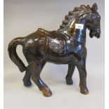 An early 20thC streaky glazed pottery model/money box fashioned as a horse  17"h
