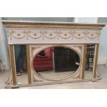 An early 20thC Continental style overmantel mirror with a central oval plate, flanked by two