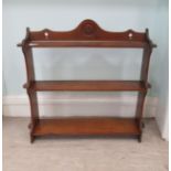 Late 19thC hanging mahogany shelves, the three tiers with pegged ends   25"h  23"w