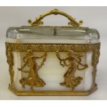 An Empire period alabaster and clear crystal covered casket with decoratively cast figures of