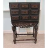 An 18th/19thC Portuguese ripple carved rosewood cabinet on stand with a mitred top, over an