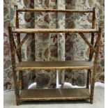 An early 20thC bamboo framed three tier hanging shelf  27"h  25"w