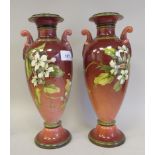 A pair of early 20thC Royal Doulton Lambeth vases, overpainted with flora  bears impressed and