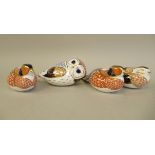 Four Royal Crown Derby china paperweights: to include a pair of pheasants with gilt stoppers