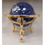 A modern globe, set with regional hardstones, in a lacquered brass frame  20"dia