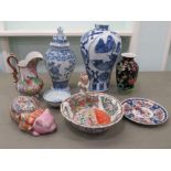 Modern Oriental ceramics: to include a vase of bulbous, tapered form, decorated in blue and white