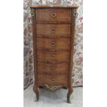 A reproduction of a 19thC French walnut veneered six drawer, serpentine front tallboy with gilt