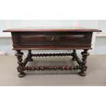 An 18thC Portuguese rosewood low table with ripple carved ornament, a lockable, shallow drawer and a