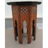 A 20thC Indian/Persian mother-of-pearl inlaid fruitwood and softwood occasional table of octagonal