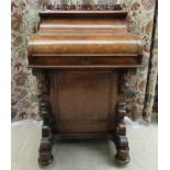 A mid Victorian burr walnut veneered Davenport, having a fret carved gallery with a rising action,