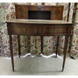 A modern crossbanded mahogany writing desk with an arrangement of drawers/doors/open shelves, the
