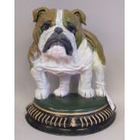 A modern Minster painted cast iron door porter, a standing bulldog, on a semi-circular base  12"h