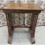 A nesting set of three 1930s walnut occasional tables with figured veneer and brass bead bordered