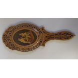 An early 20thC Sorrento ware hand mirror, the bevelled oval plate set in a fretworked frame and a