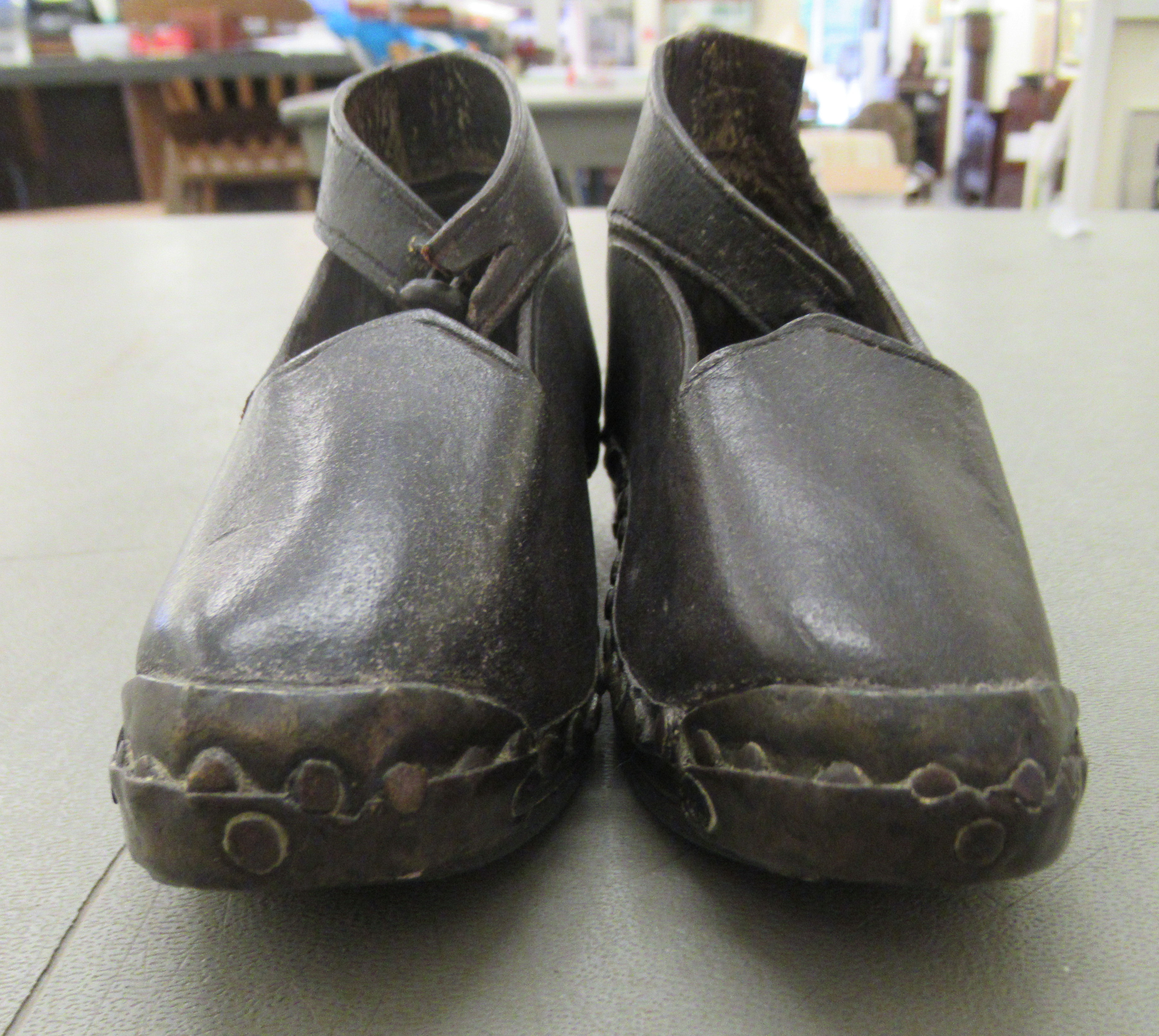 A child's pair of 19thC clogs with wooden soles and rivetted hide uppers - Image 2 of 6
