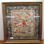 A 20thC Chinese embroidered picture, featuring flora and artefacts  17" x 15"  framed