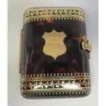 A Victorian gold piquetworked tortoiseshell, cushion shape sovereign purse, the hinged cover