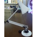 A white enamelled Anglepoise lamp