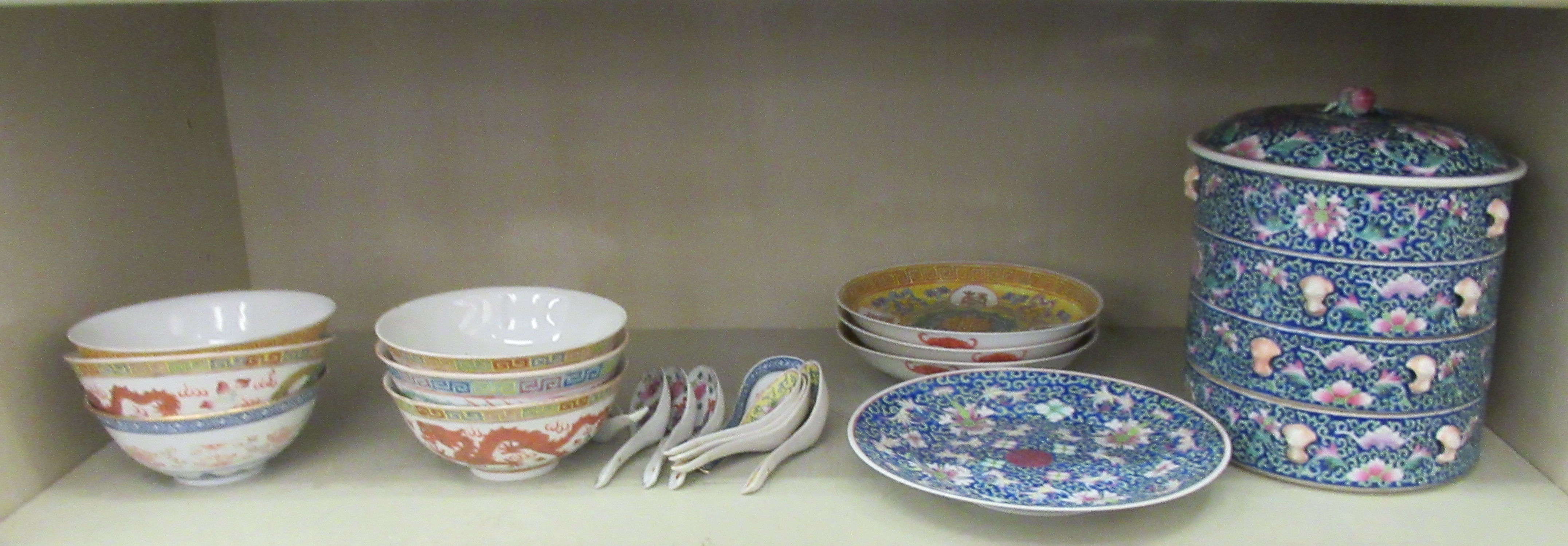 Modern Chinese porcelain tableware: to include a four part food warmer; and six footed bowls