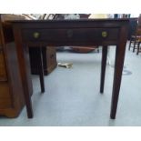 A late 18th/early 19thC oak side table, the plank top over a shallow, long drawers, raised on