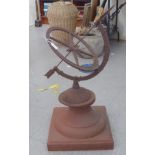 A modern antique finished iron terrace ornament, a sundial set on a terracotta plinth  30"h overall