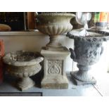 A pair of composition stone terrace pedestal vases of campana form  15"h  17"dia and a separate
