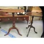 An early 19thC country made oak pedestal table, the tip top over a vase turned column, raised on a