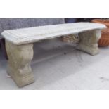 A composition stone, three part terrace bench 40"w