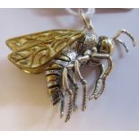 A bi-coloured metal pendant, fashioned as a bee
