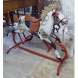 A mid 20thC Triang painted tinplate nursey rocking horse, raised on a red painted splayed underframe